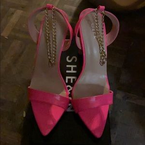 Hot pink vinyl heels
